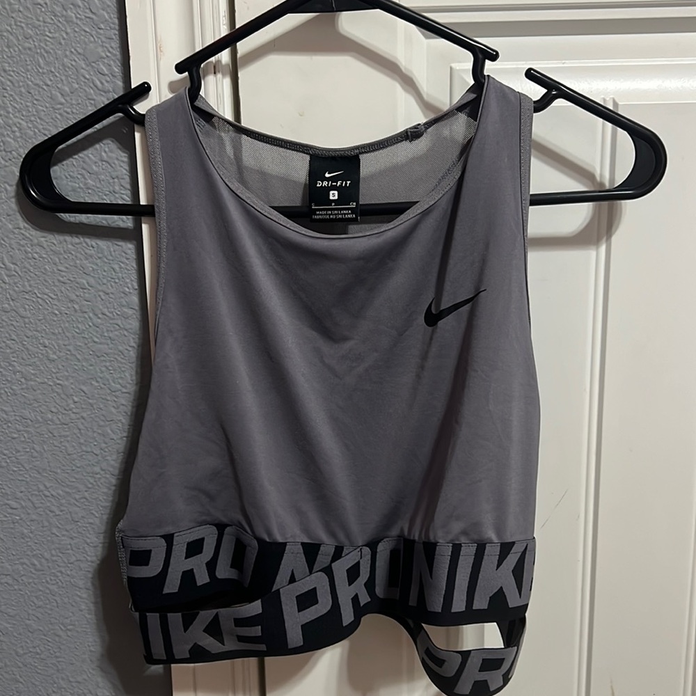 Small nike pro workout tank. Has never been worn, kind of see through.